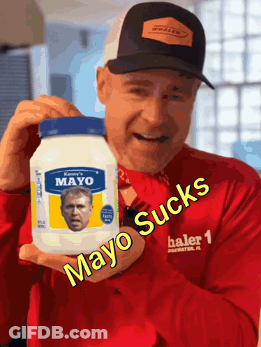 A Man Is Holding A Jar Of Mayo With A Picture Of George Bush On It GIF