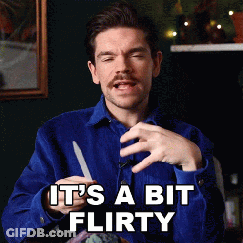 A Man Is Holding A Knife And Says It 'S A Bit Flirty GIF