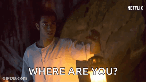 A Man Is Holding A Lantern And Asking Where Are You ? GIF