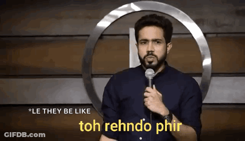 A Man Is Holding A Microphone And Saying `` Le They Be Like Toh Rehndo Phir '' . GIF