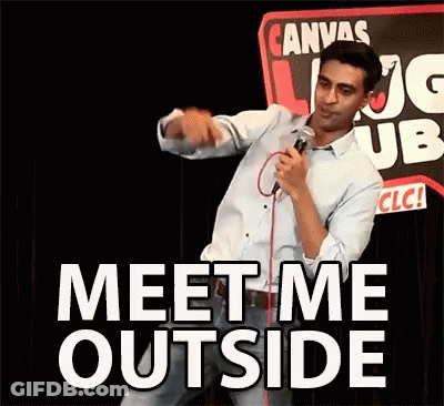 A Man Is Holding A Microphone And Saying " Meet Me Outside " GIF
