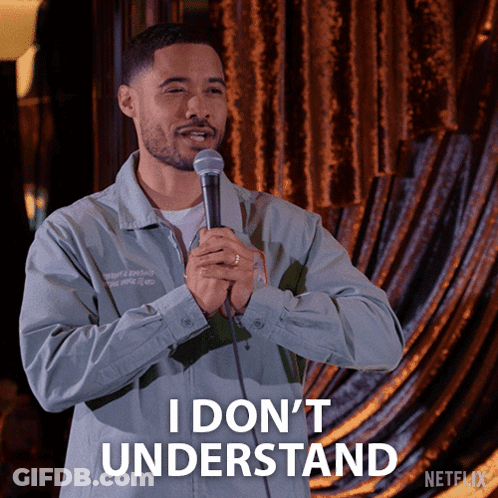 A Man Is Holding A Microphone And Says I Don T Understand GIF