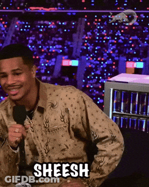 A Man Is Holding A Microphone And The Word Sheesh Is On The Screen GIF