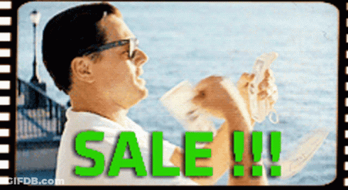 A Man Is Holding A Newspaper With The Word Sale Written In Green GIF