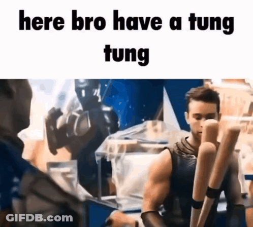 A Man Is Holding A Pair Of Baseball Bats And Talking To Another Man In A Room . GIF