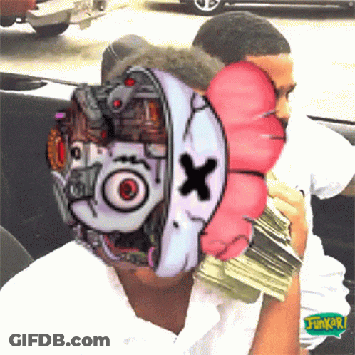 A Man Is Holding A Pile Of Money With A Cartoon Face On His Face .. GIF