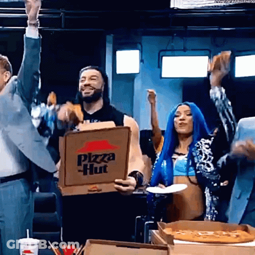 A Man Is Holding A Pizza Hut Box In His Hand GIF