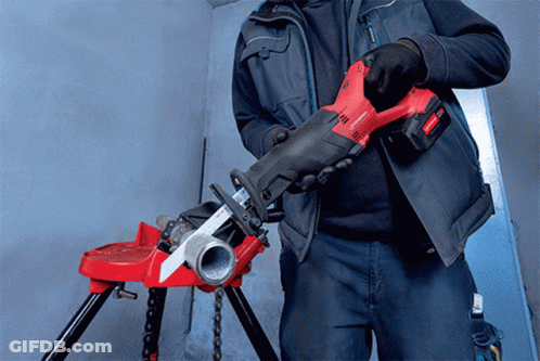 A Man Is Holding A Red And Black Tool That Says ' Rothenberger ' On It GIF