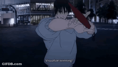 A Man Is Holding A Red Object In His Hand In Front Of A Building . GIF