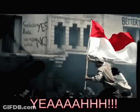 A Man Is Holding A Red White And Blue Flag In Front Of A Sign That Says Better GIF