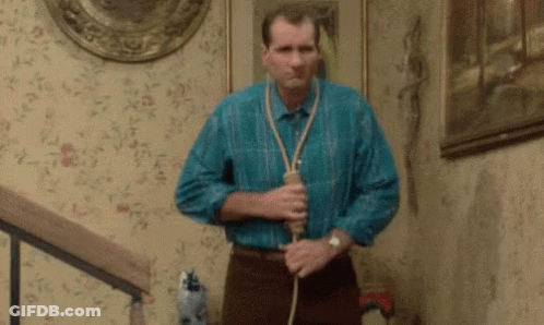 Man With Rope Around Neck On Stairs GIF
