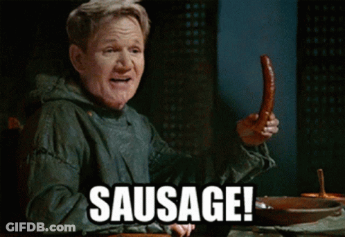 A Man Is Holding A Sausage With The Word Sausage Behind Him GIF