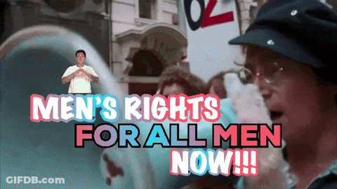 A Man Is Holding A Sign That Says Men 'S Rights For All Men Now GIF