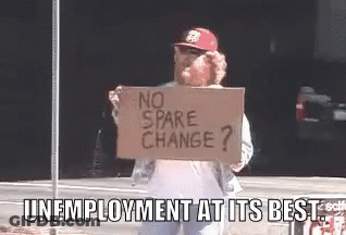 A Man Is Holding A Sign That Says No Spare Change ? Unemployment At Its Best . GIF