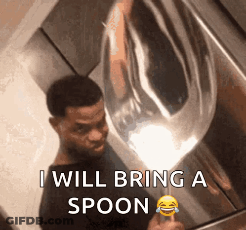 A Man Is Holding A Spoon In Front Of A Mirror And Says I Will Bring A Spoon GIF