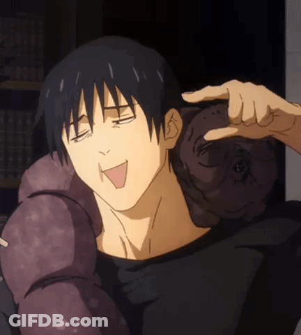 A Man Is Holding A Stuffed Animal On His Shoulder While Making A Funny Face . GIF