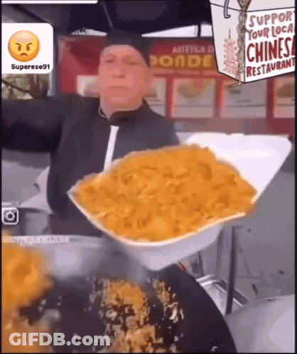 A Man Is Holding A Styrofoam Container Full Of Food In Front Of A Sign That Says Support Your Local Chinese Restaurant GIF