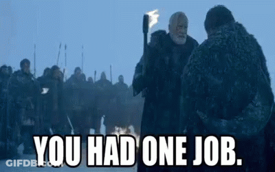 A Man Is Holding A Torch In Front Of A Crowd Of People And Saying `` You Had One Job '' . GIF