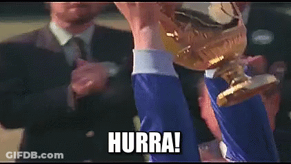 A Man Is Holding A Trophy In His Hand With The Words Hurra Written On The Bottom . GIF
