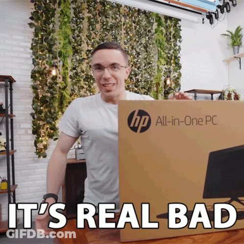 A Man Is Holding An Hp All-In-One Pc Box And Says It 'S Real Bad GIF