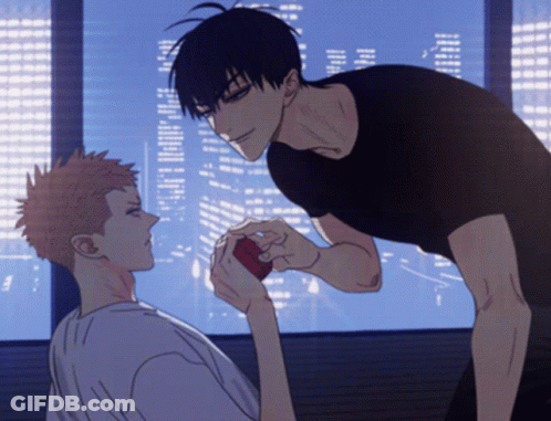 A Man Is Holding Another Man 'S Hand In Front Of A City Skyline GIF
