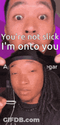 A Man Is Holding Another Man 'S Head With The Words You 'Re Not Slick I 'M Onto You On The Bottom GIF