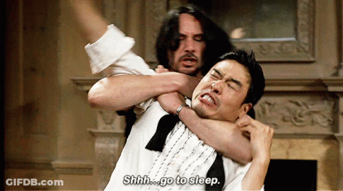 A Man Is Holding Another Man 'S Neck And Says Shhh Go To Sleep GIF