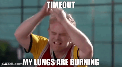A Man Is Holding His Head With His Hands While Making A Funny Face And A Meme . GIF