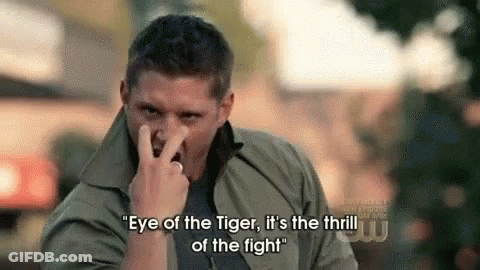 A Man Is Holding His Nose And Saying `` Eye Of The Tiger , It 'S The Thrill Of The Fight '' GIF