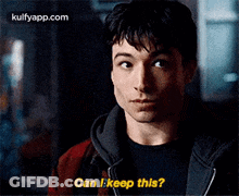 A Man Is Holding Something In His Hand And Asking Can I Keep This . GIF