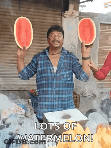 A Man Is Holding Two Slices Of Watermelon In His Hands With The Words Lots Of Watermelon Below Him GIF