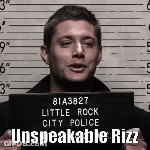 A Man Is Holding Up A Little Rock City Police Mugshot GIF