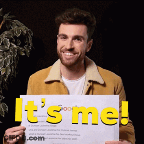 A Man Is Holding Up A Sign That Says It 'S Me GIF