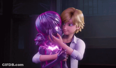 A Man Is Hugging A Purple Statue Of A Ladybug . GIF