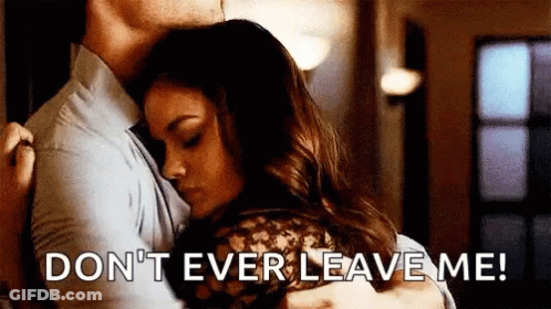 A Man Is Hugging A Woman With The Words `` Don 'T Ever Leave Me '' Written On The Screen . GIF