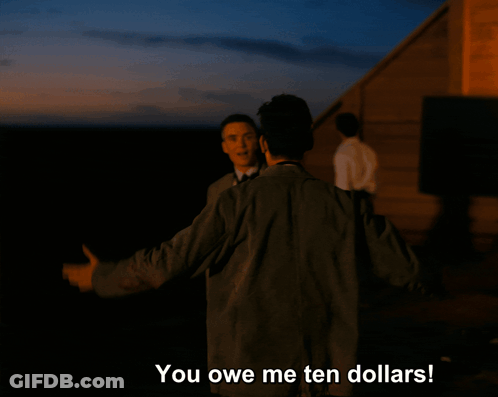 A Man Is Hugging Another Man With The Words You Owe Me Ten Dollars Below Him GIF