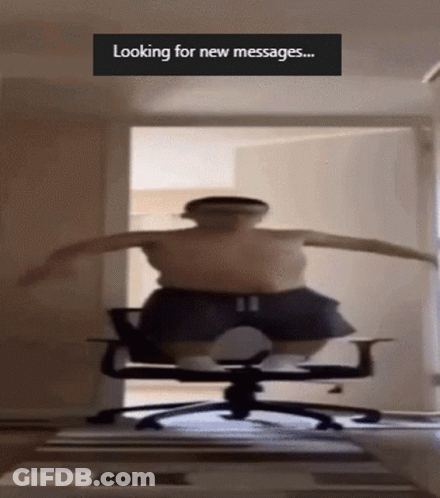 A Man Is Jumping In A Chair With The Words Looking For New Messages Written Above Him GIF