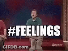 A Man Is Jumping In The Air With The Words `` Feelings '' Written On The Screen Behind Him . GIF
