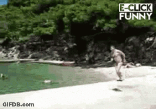 A Man Is Jumping Into A Body Of Water With The Words E-Click Funny On The Bottom GIF