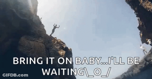 A Man Is Jumping Off A Cliff With The Words `` Bring It On Baby ... I 'Ll Be Waiting . '' GIF