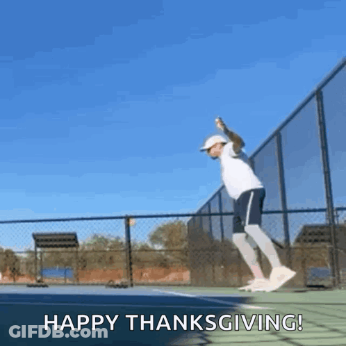 A Man Is Jumping On A Tennis Court With The Words Happy Thanksgiving Written Below Him GIF