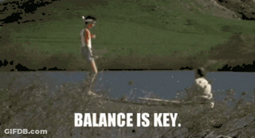 A Man Is Jumping Over A Body Of Water With The Words Balance Is Key GIF