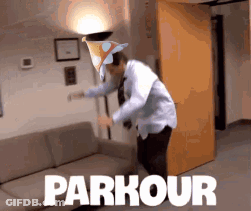 A Man Is Jumping Over A Couch And The Word Parkour Is On The Floor GIF