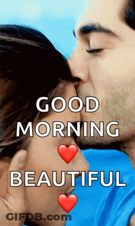 A Man Is Kissing A Woman On The Cheek And The Words `` Good Morning Beautiful '' Are Above Them . GIF