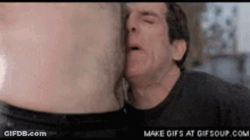 A Man Is Kissing Another Man 'S Stomach In A Movie Clip From Movieclips.com GIF