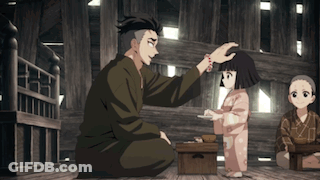 A Man Is Kneeling Down And Petting A Little Girl 'S Head While A Group Of Children Sit Around Him . GIF
