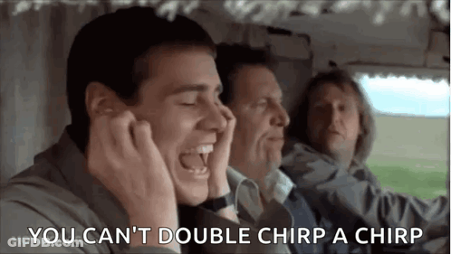 A Man Is Laughing While Sitting In A Car With Two Other Men And Covering His Ears . GIF