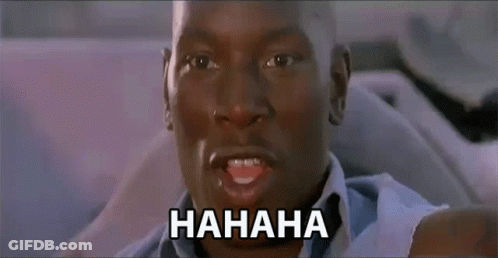 A Man Is Laughing With The Word Hahaha On The Bottom Right GIF