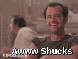 A Man Is Laughing With The Words `` Awww Shucks '' Written On The Screen . GIF