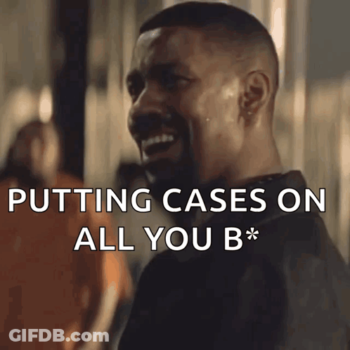 A Man Is Laughing With The Words Putting Cases On All You B* GIF